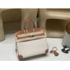25cm Birkin (Fabric & Swift Leather) – Color: 37 Gold The fabric material gives a more youthful look and is lighter than full-leather versions, which is its key feature.