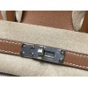 25cm Birkin (Fabric & Swift Leather) – Color: 37 Gold The fabric material gives a more youthful look and is lighter than full-leather versions, which is its key feature.