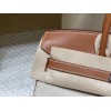 25cm Birkin (Fabric & Swift Leather) – Color: 37 Gold The fabric material gives a more youthful look and is lighter than full-leather versions, which is its key feature.