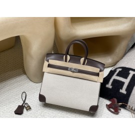 25cm Birkin (Fabric & Swift Leather) – Color: 46 Ebene The canvas material creates a more youthful atmosphere and is lighter and easier to use compared to full-leather versions, which is its key feature.