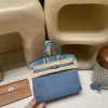 Hermès Birkin 25 (Trianon Canvas & Leather) – Color: Blue Jean (with Silver Hardware) – This limited-edition model is an extremely rare piece even among Hermès collections. Its classic yet stylish design stands out, and it features a retro-modern atmosphe