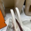 Hermès Birkin 25 (Triomphe H Canvas & Swift Leather) – Color: I2/Nata (with Silver Hardware) – A soft cream-white hue – This model is characterized by a combination of high-quality Swift leather and lightweight canvas. The natural cream-white color create