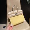 Hermès Birkin 25 (Triomphe H Canvas & Swift Leather) – Color: I2/Nata (with Silver Hardware) – A soft cream-white hue – This model is characterized by a combination of high-quality Swift leather and lightweight canvas. The natural cream-white color create