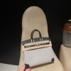 25cm Birkin (Canvas & Swift Leather) – Color: 2Z/Blue Nuit – The canvas part gives a youthful impression and is lighter than full-leather versions.