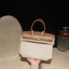 Hermès Birkin 30 (Swift Leather & Canvas) – Color: 37/Gold with Gold Hardware The attractive fusion of Swift leather and canvas creates an elegant vintage style – a rare model with great collector value.