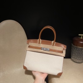 Hermès Birkin 30 (Canvas & Barenia Leather) – Color: 37/Gold with Gold Hardware – The youthfulness brought by the canvas and the luxury of Barenia leather blend beautifully – a rare specification that is lighter and easier to use than full-leather models.